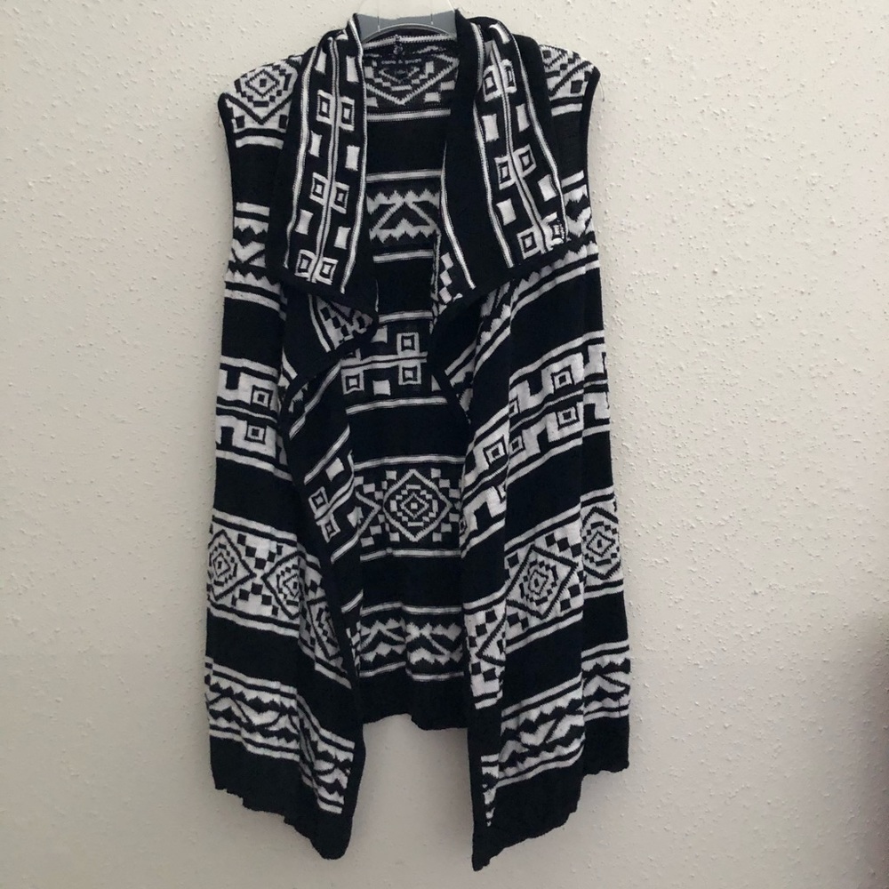 COPY - Black and white sweater vest.